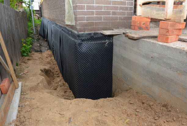 Happy homeowners after waterproofing job in Sweetwater